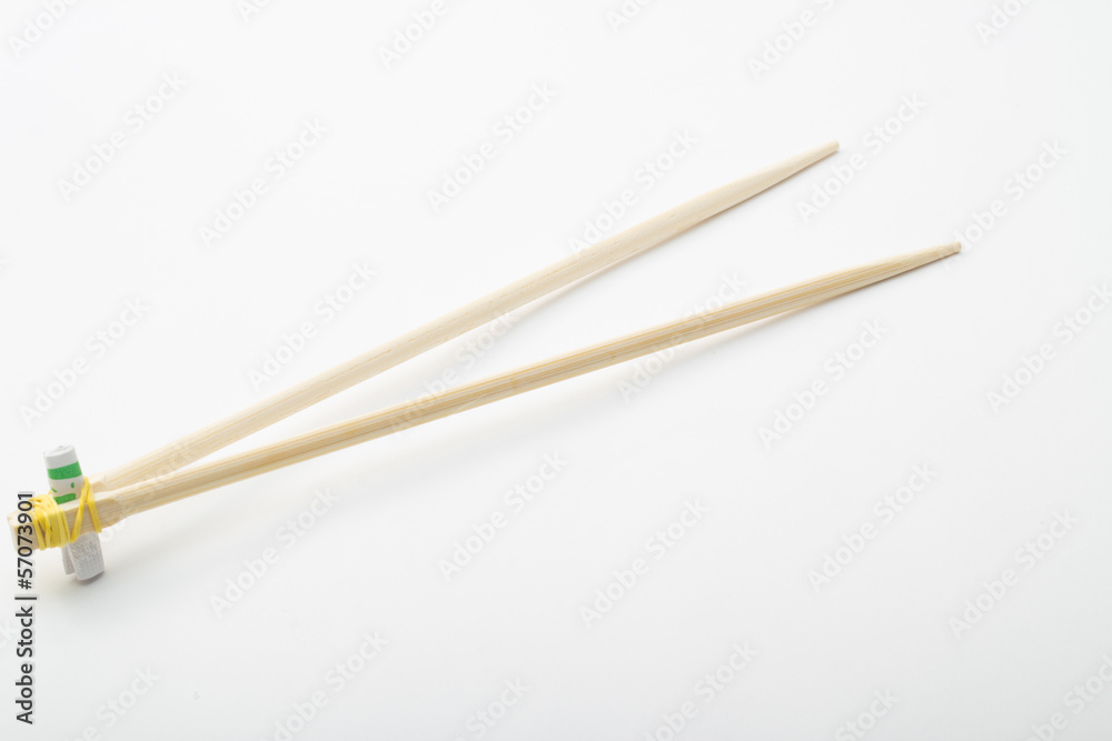 Bamboo chopsticks on white background Bamboo chopsticks on white background