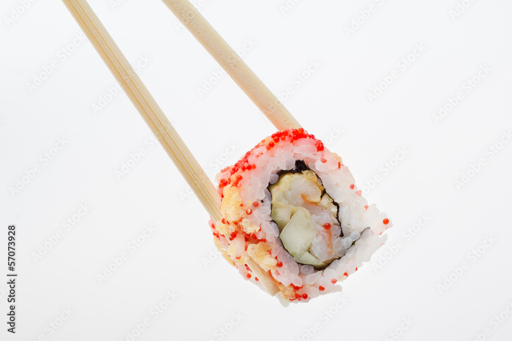 Single sushi roll in tempura and chopsticks Single sushi roll in tempura and chopsticks