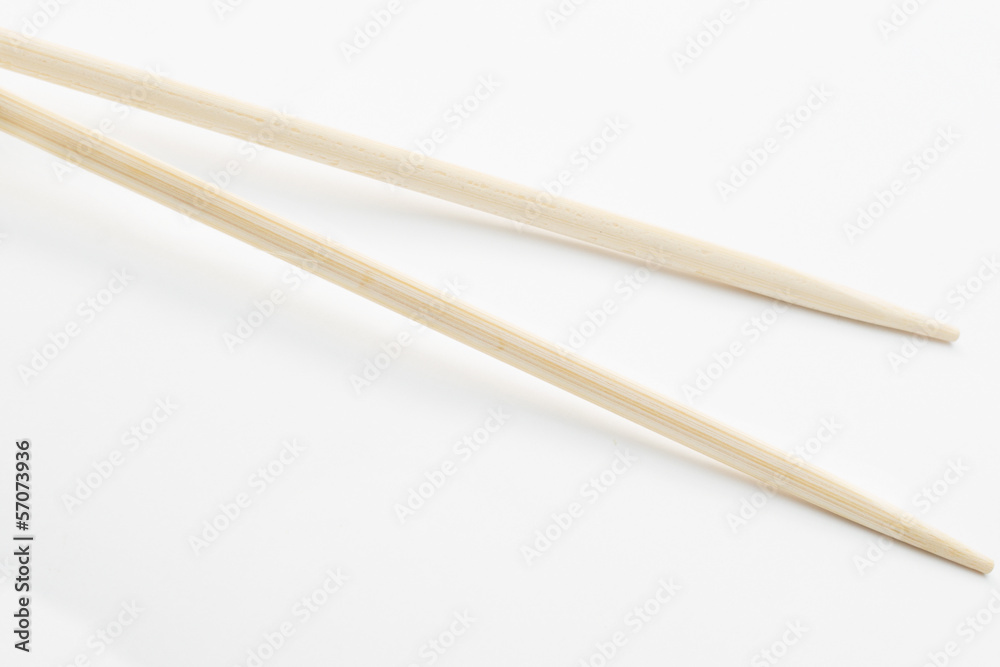 Obraz premium Bamboo chopsticks on white background