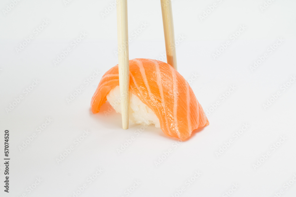 Salmon sushi nigiri with chopsticks Salmon sushi nigiri with chopsticks