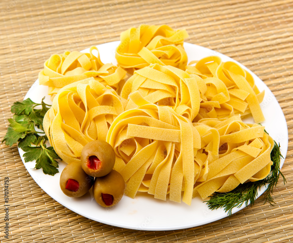 Italian fettuccine nest pasta on a plate