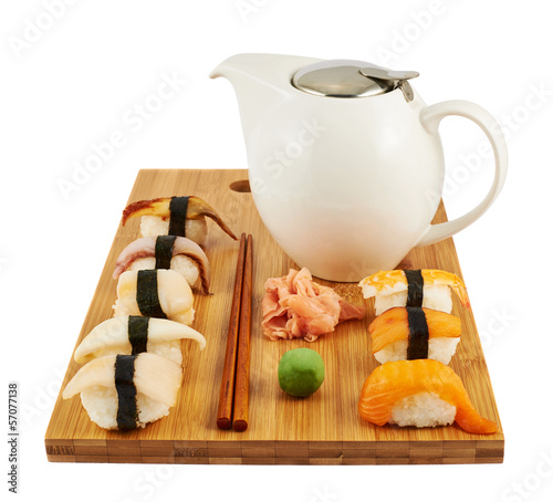 Sushi composition over cutting board photo