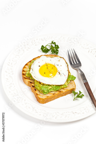 Healthy Breakfast. Egg and Avocado Toast.