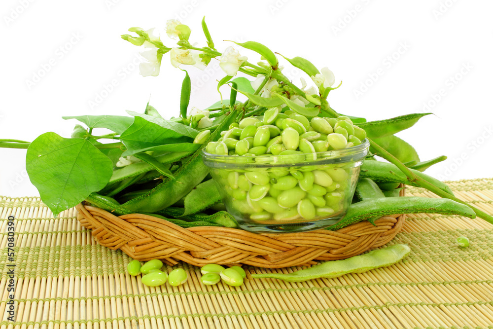peeled valor papdi beans and plant part closeup