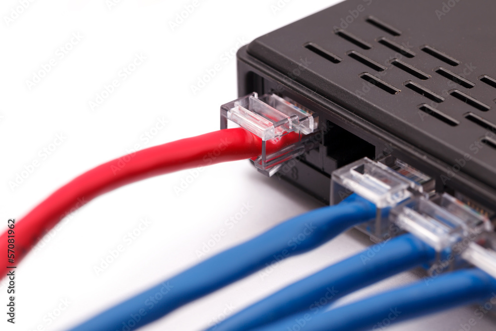 LAN network switch with ethernet cables plugged in LAN network switch with ethernet cables plugged in