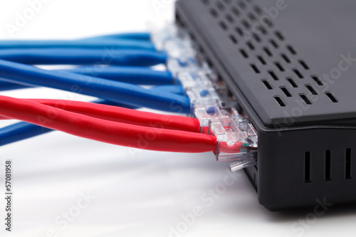 Fotografía LAN network switch with ethernet cables plugged in