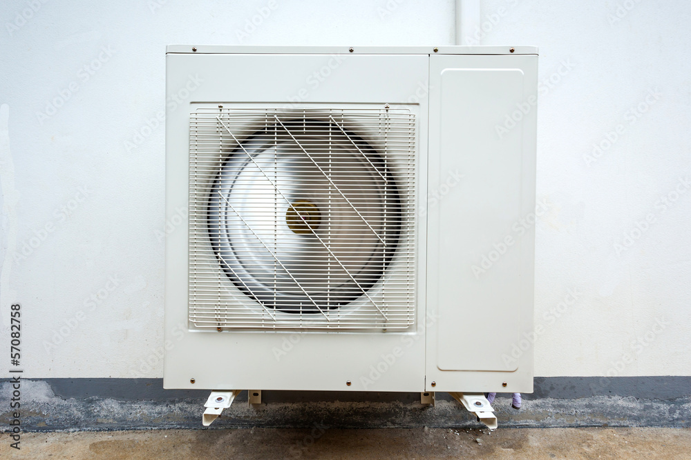 Outdoor Unit of Air Conditioner on the Wall Outdoor Unit of Air Conditioner on the Wall