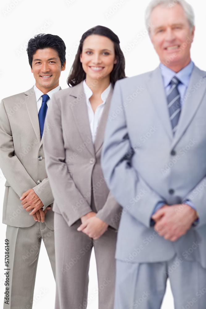 Young sales people together with mentor Young sales people together with mentor