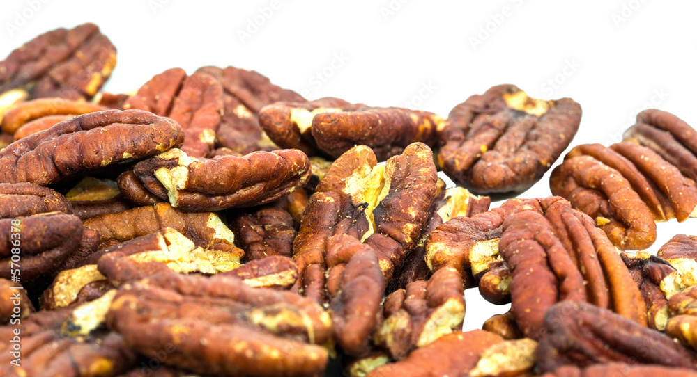 Pecan nuts over white background