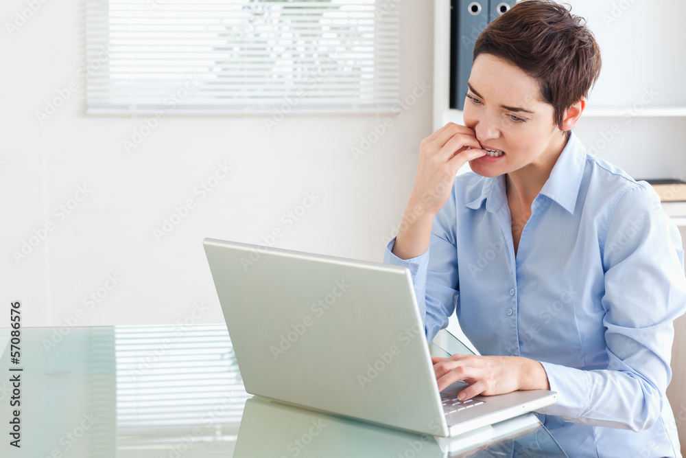 Angry brunette Businesswoman with a laptop Angry brunette Businesswoman with a laptop