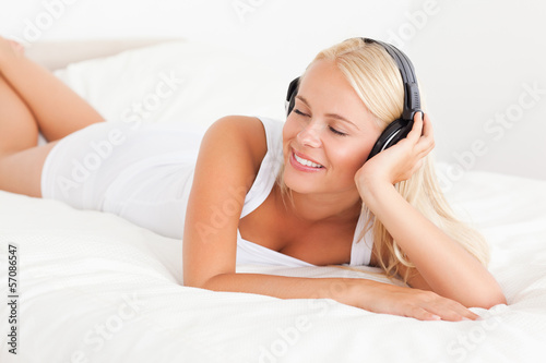 Smiling woman listening to music