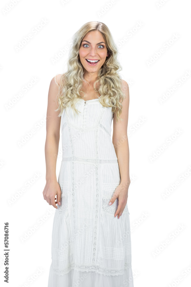 Surprised attractive model in white dress posing Surprised attractive model in white dress posing