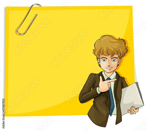 A boy in front of the big empty paper with a clip
