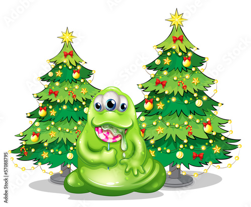 Christmas trees at the back of the monster with a lollipop