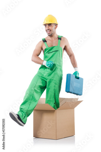 Man in coveralls with boxes © Elnur