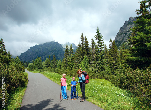 Family and High Tatras (Slovakia) summer view.