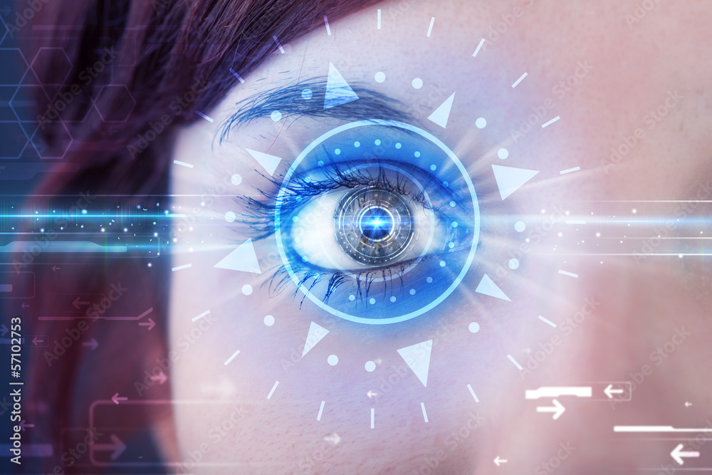 Cyber girl with technolgy eye looking into blue iris Cyber girl with technolgy eye looking into blue iris