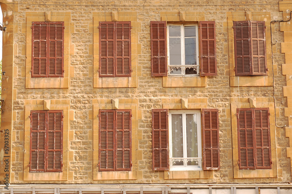 Fototapeta premium Facade of a building with 8 windows