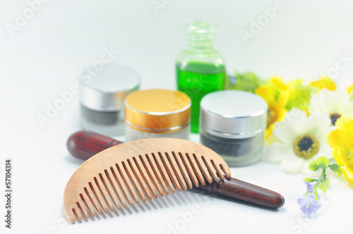 An ethnic wooden comb and spa set