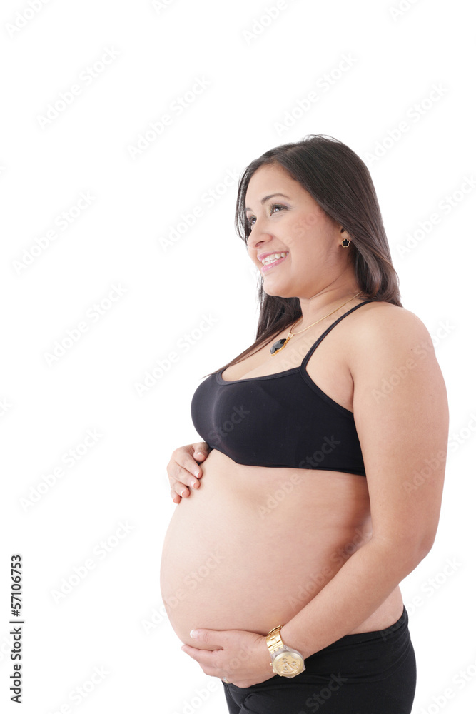 Happy pregnant woman looking to a copyspace isolated Happy pregnant woman looking to a copyspace isolated
