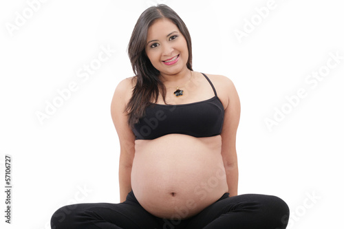 Hispanic pregnant woman isolated