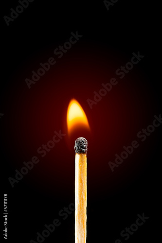 burning match with red glow