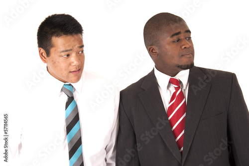 Two brothers looking out in dress shirts and ties