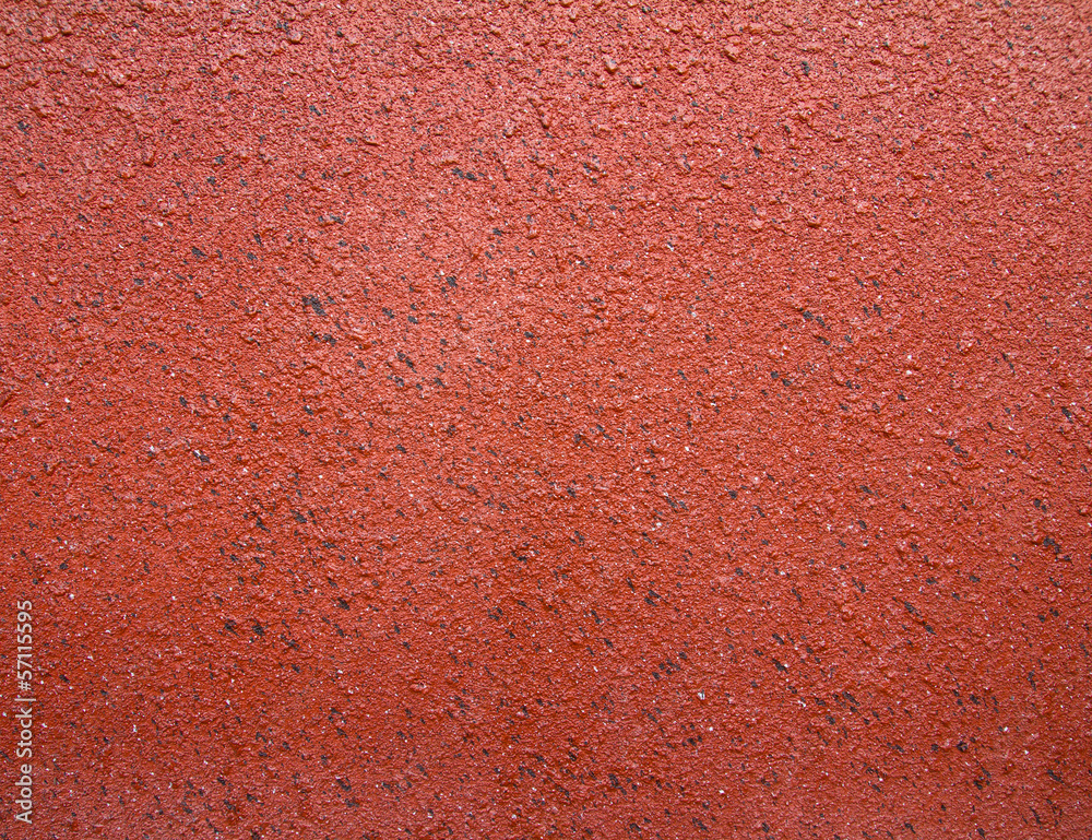 Surface of sandstone plastered concrete walls, orange and brown Surface of sandstone plastered concrete walls, orange and brown