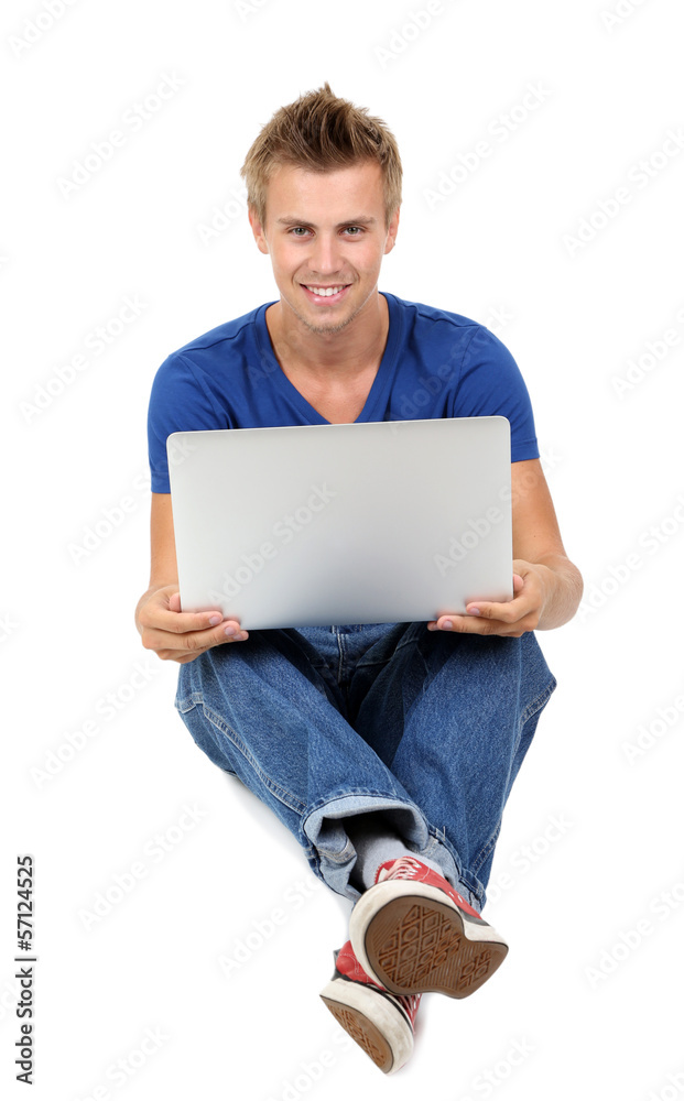 A handsome young man with laptop isolated on white A handsome young man with laptop isolated on white
