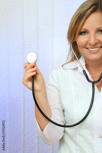 Young beautiful doctor with...