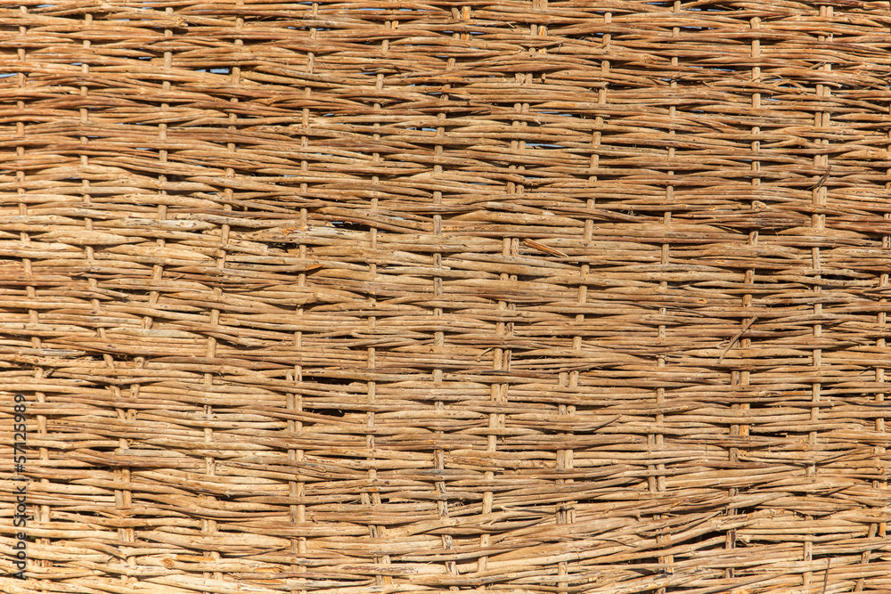 a woven willow wicker fence panel suitable for crafts, picnic or a woven willow wicker fence panel suitable for crafts, picnic or