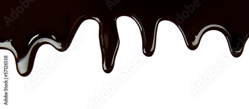 Melted chocolate dripping on white background