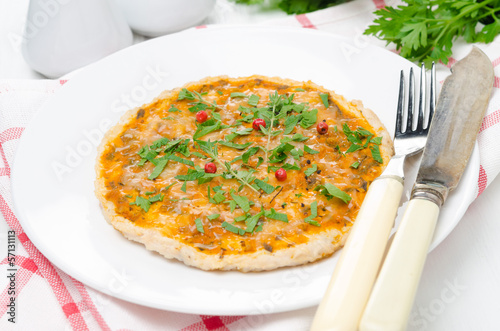 chicken pizza with tomato sauce, cheese and herbs
