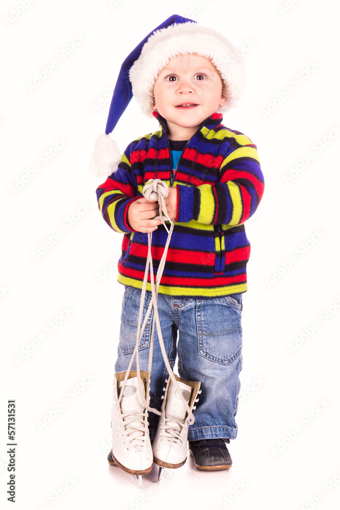 Cute little boy with figure skates Cute little boy with figure skates