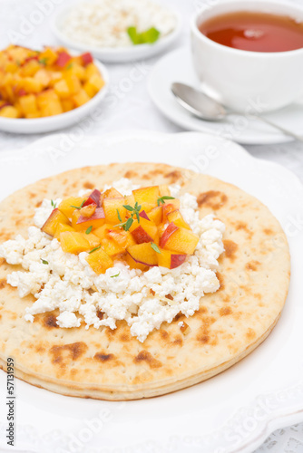Flat bread with cottage cheese, honey, nuts, peaches