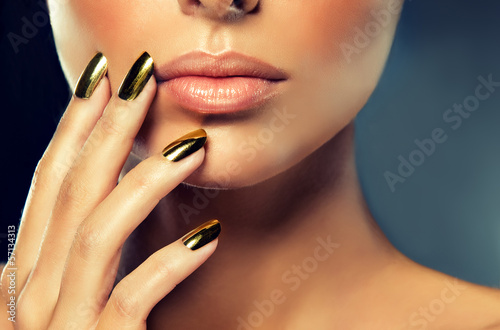 Golden makeup and metal gold nails #57134313