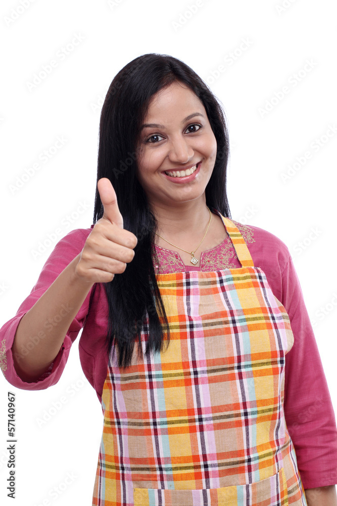 Happy young Indian woman wearing kitchen apron Stock Photo Adobe Stock