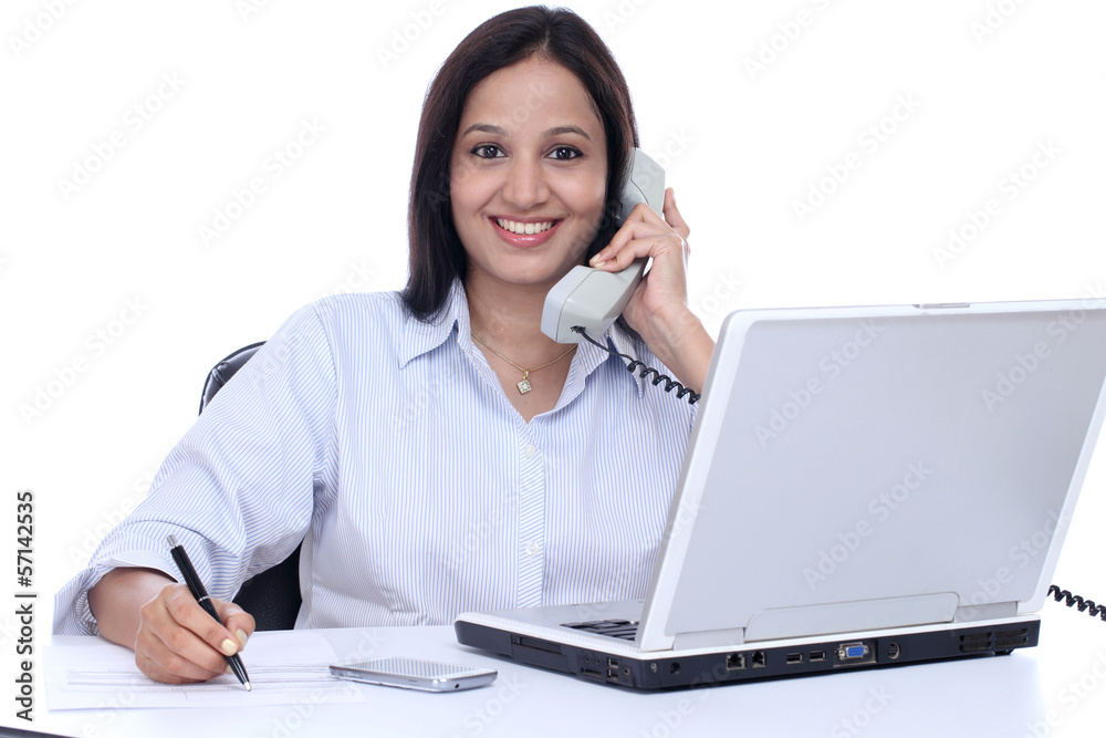 Cheerful business woman talking on phone Cheerful business woman talking on phone
