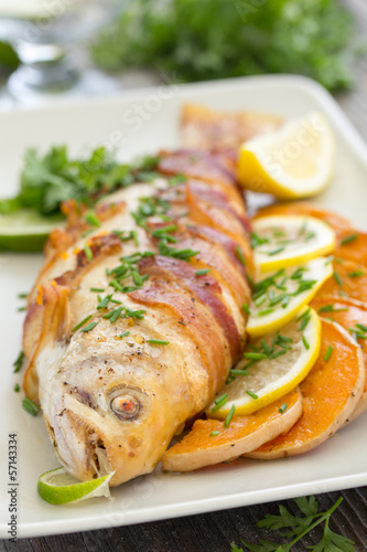 Fish (trout) baked with pumpkin and vegetables.