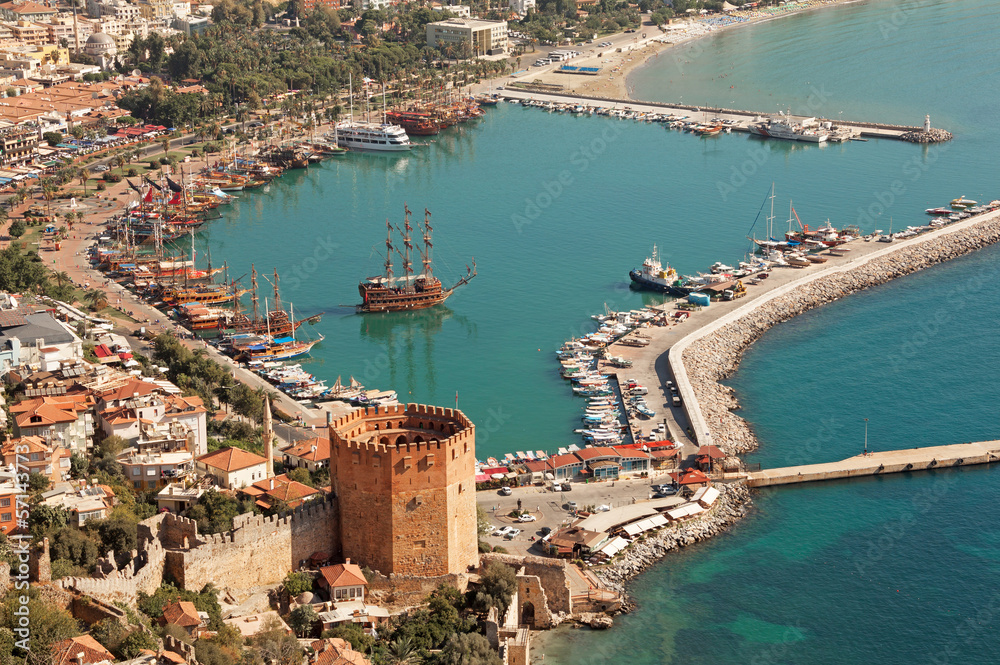 Alanya harbor and Kizil Kule tower. Turkey.