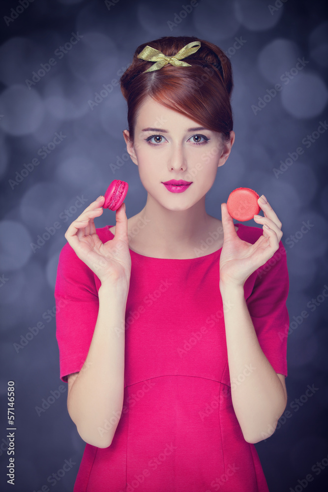 Redhead girl with macaron for St. Valentine Day. Redhead girl with macaron for St. Valentine Day.