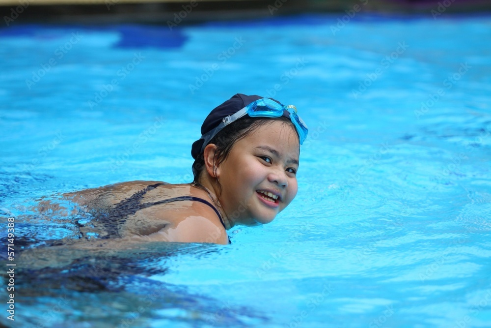 portrait of Asian girl swiming with happy