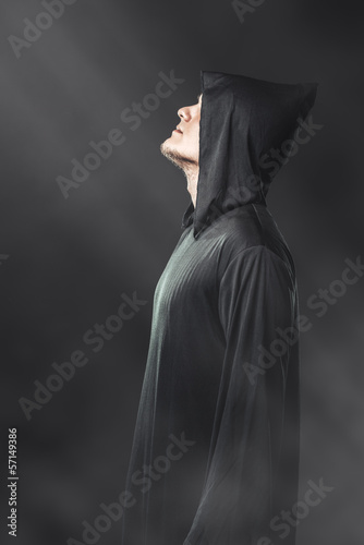 Guy Black Robe Standing Dark Under Foto stock 157272071