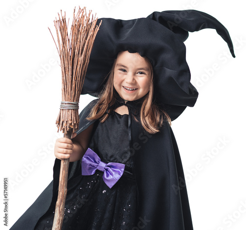 Fototapeta little witch with a broom