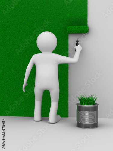 Man paints a wall with roll...