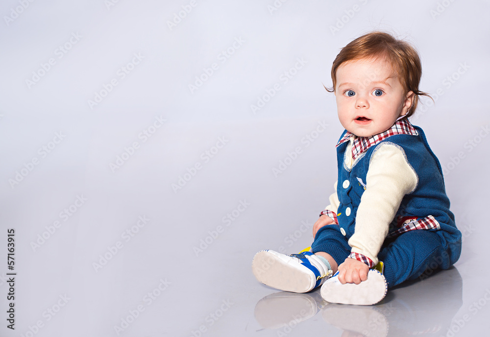 Little baby sitting on the floor Little baby sitting on the floor