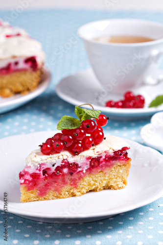 A piece of meringue red currant cake