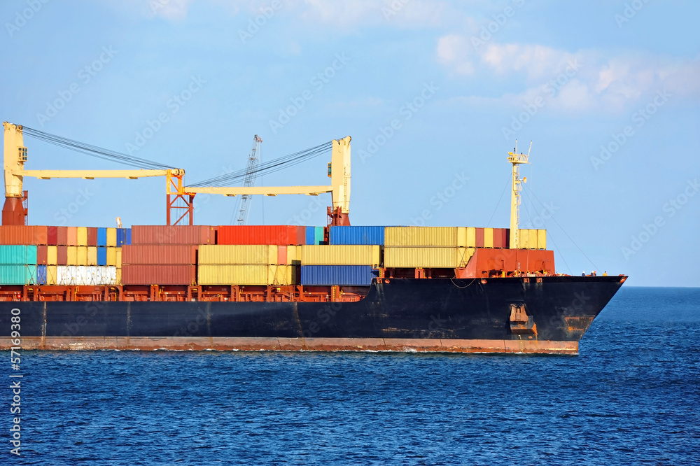 Fototapeta premium Container stack on freight ship in Black sea, Odessa, ukraine