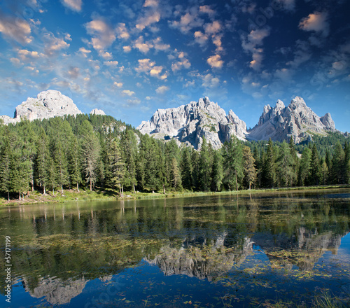 Beautiful alpin landscape. Mountain peaks reflected into a lake © jovannig