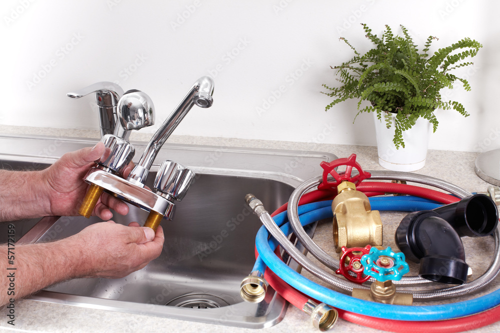 Obraz premium Plumber with a water tap.